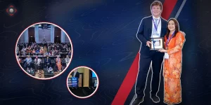 COSC 2026 keynote, Dr. Dion Paridaens receiving his keynote award in Kuala Lumpur, with the conference hall